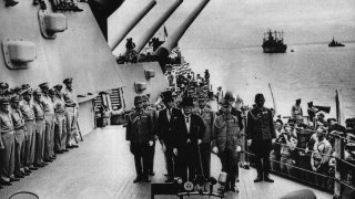 File photo taken on Sept. 2, 1945, shows Japan’s surrender ceremony aboard the United States Navy battleship USS Missouri anchored in Tokyo Bay.