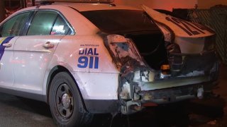 The trunk of a Philadelphia Police Department cruiser is blackened after catching fire in a blaze that investigators called suspicious.