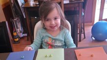 Sarah Jones, 4, uses cereal for one of her lessons.