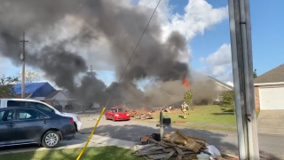 This screenshot from video shows the scene of the Navy airplane crash.