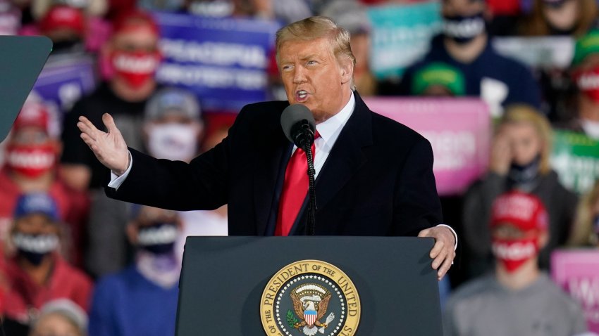 President Donald Trump speaks at a campaign rally at Des Moines International Airport, Wednesday, Oct. 14, 2020, in Des Moines, Iowa.