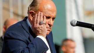 Former New York City Mayor Rudy Giuliani, personal attorney to U.S. President Donald Trump, gestures after media announced that Democratic U.S. presidential nominee Joe Biden has won the 2020 U.S. presidential election, in, Philadelphia, Pennsylvania, U.S., November 7, 2020.