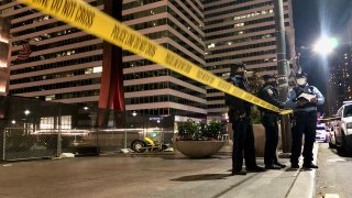 dirtbike on the ground at a shooting scene in philadelphia