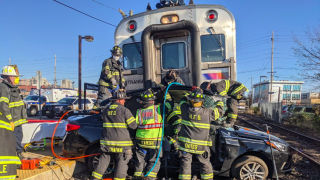 Firefighters responded to a collision between a NJ Transit line and passenger vehicle.