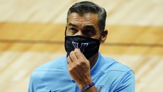 Jay Wright with a mask on