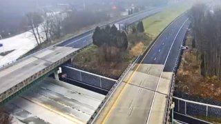 Northbound and southbound lanes of Interstate 95 are shown empty after a closure in Wilmington, Delaware.