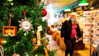 People shop for holiday items at the Country Store on Main Street in Stockbridge, Massachusetts on December 13, 2020.
