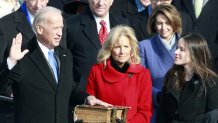 Vice President-elect Joseph Biden is sworn in during the inauguration of Barack Obama as the 44th President of the United States of America on the West Front of the Capitol Tuesday, Jan. 20, 2009 in Washington, Biden's wife, Jill, holds the Bible.
