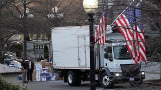 A moving van arrives to pick up boxes that were moved out of the Eisenhower Executive Office