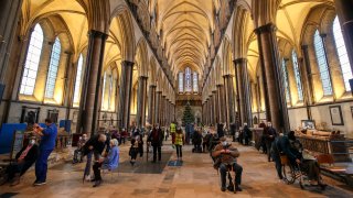 Members of the public receive the Pfizer-BioNTech coronavirus vaccine, at Salisbury Cathedral