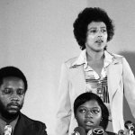 Elaine Brown, chairwoman of the Black Panther Party (back), introduces Joanne Little, right, in Oakland, California, Aug. 22, 1975. Little had recently acquitted of the murder of her white jailer.