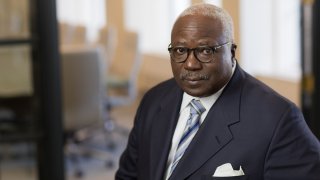 Bernard Smalley looks at the camera in a portrait photo. Smalley was elected the first Black president of the Board of Directors of City Trusts in the agency's 151-year history.