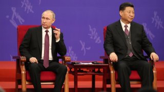 Russian President Vladimir Putin, left, and Chinese President Xi Jinping, right, attend the Tsinghua Universitys ceremony, at Friendship Palace on April 26, 2019 in Beijing, China.