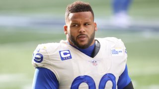 In this Jan. 9, 2021, file photo, Aaron Donald #99 of the Los Angeles Rams looks on the NFC Wild Card Playoff game against the Seattle Seahawks at Lumen Field in Seattle, Washington.