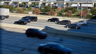 Traffic on the I-95 rolls past Penns Landing, in Philadelphia, PA,