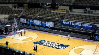 The Indiana Farmers Coliseum scoreboard goes dark after a first round NCAA college basketball tournament game between Iowa and Grand Canyon, March 20, 2021, in Indianapolis. The VCU Oregon game scheduled to be played after the Iowa Grand Canyon game was canceled after VCU was pulled from the NCAA Tournament because of COVID-19 protocols.