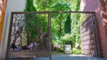 This image shows a gate opening into John F. Collins Park in Philadelphia