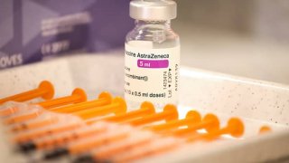 A vial of AstraZeneca COVID-19 vaccine is seen with syringes at the Military Institute of Medicine hospital in Warsaw, Poland on March 25, 2021.