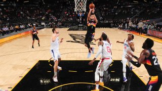 Devin Booker #1 of the Phoenix Suns shoots the ball during the game against the LA Clippers on April 28, 2021 at Phoenix Suns Arena in Phoenix, Arizona.