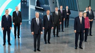 U.S. President Joe Biden and other NATO heads of the states and governments pose for a family photo during the NATO summit at the Alliance’s headquarters, in Brussels, Belgium June 14, 2021.