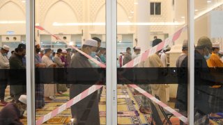 Malaysian Muslims perform tarawih prayers on the first night of Ramadan at a mosque in Selangor on April 12, 2021.