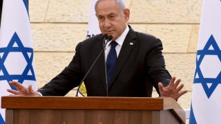 Israeli Prime Minister Benjamin Netanyahu speaks during a ceremony to mark Yom HaZikaron, Israel's Memorial Day for fallen soldiers, at the Yad LeBanim House in Jerusalem on April 13, 2021.