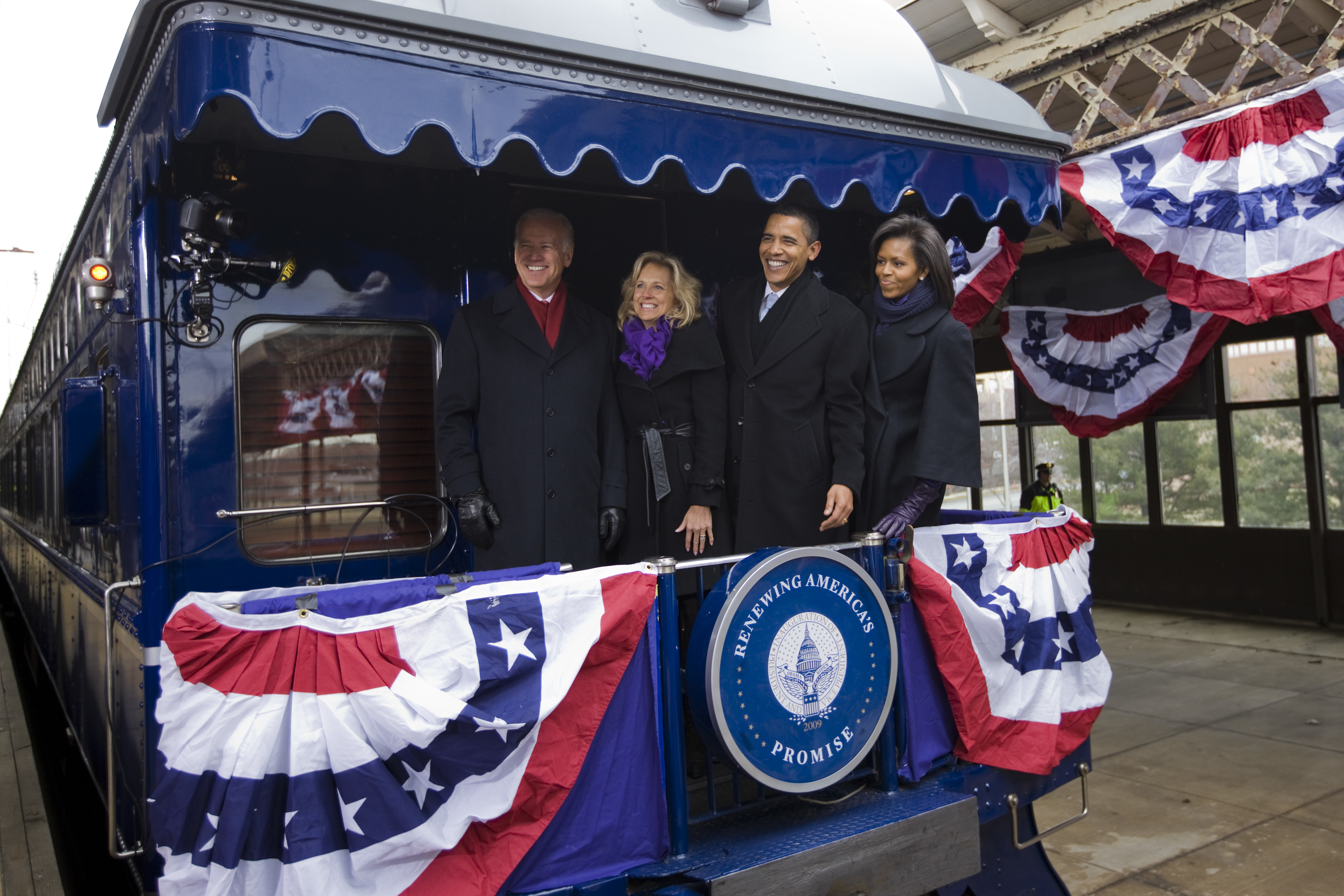 President-elect Barack Obama, his wife Michelle, Vice President-elect Joe Biden and his wife Jill board their train at a station in Wilmington, Delaware, January 17, 2009. They are on a train trip to Washington to kick off several days of inauguration festivities with Obama being sworn in as the 44th President of the United States on January 20. (Photo by Brooks Kraft LLC/Corbis via Getty Images)