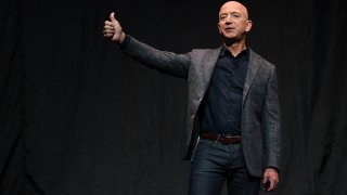 Founder, Chairman, CEO and President of Amazon Jeff Bezos gives a thumbs up as he speaks during an event about Blue Origin’s space exploration plans in Washington, U.S., May 9, 2019.