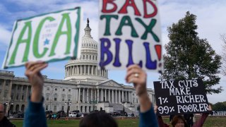 Demonstrators join a rally against the proposed Republican tax reform legislation on the east side of the U.S. Capitol November 15, 2017 in Washington, DC.