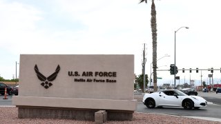 LAS VEGAS, NEVADA - APRIL 03: A sign near the main gate of Nellis Air Force Base is shown on April 3, 2020 in Las Vegas, Nevada. On Friday, the 99th Air Base Wing Commander Col. Cavan Craddock declared a public health emergency at the base as a result of the coronavirus, allowing for greater access to health care resources and more authority to limit access to the installation. Beginning on April 6th, access to the base will be limited to mission essential personnel and those who reside at the base. The World Health Organization declared the coronavirus (COVID-19) a global pandemic on March 11th.