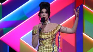 Dua Lipa wins the Female Solo Artist award during The BRIT Awards 2021 at The O2 Arena on May 11, 2021 in London, England.