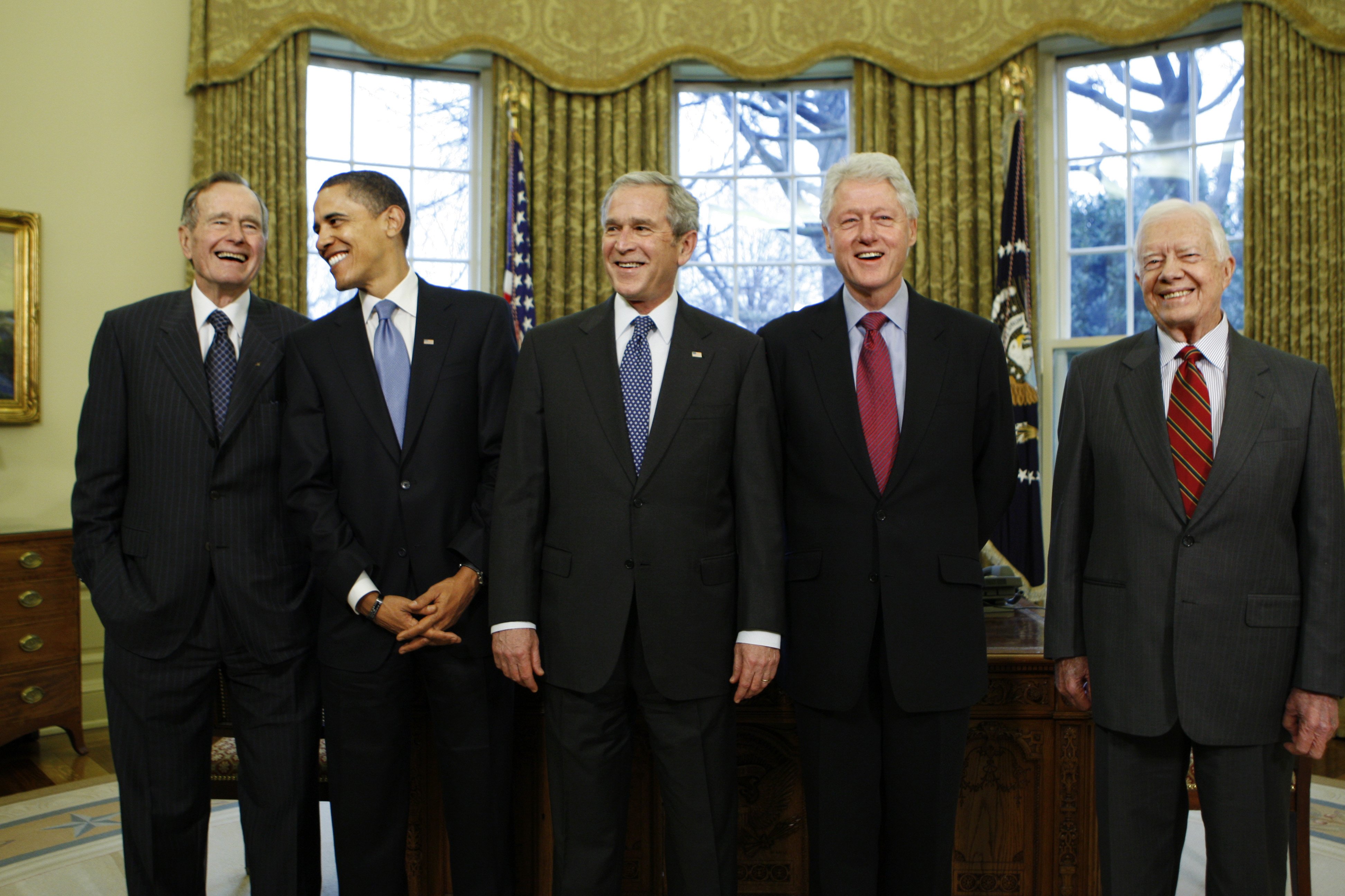 President-elect Barack Obama is welcomed by President George W. Bush for a meeting at the White House in Washington, Wednesday, Jan. 7, 2009, with former presidents George H.W. Bush, Bill Clinton and Jimmy Carter.