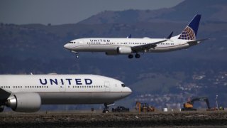 A United Airlines Boeing 737 Max 9 aircraft lands at San Francisco International Airport.