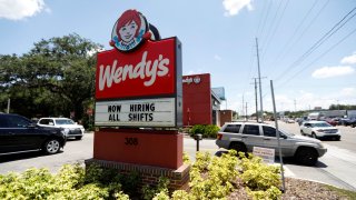 A Wendy’s restaurant displays a “Now Hiring” sign in Tampa, Florida, June 1, 2021.