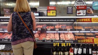 A customer shops for meat at a supermarket on June 10, 2021 in Chicago, Illinois. Inflation rose 5% in the 12-month period ending in May, the biggest jump since August 2008.