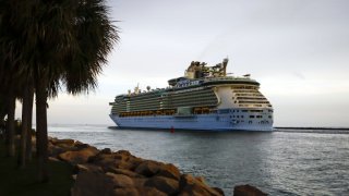 The Royal Caribbean Cruises Freedom of the Seas ship departs for a simulated voyage from PortMiami in Miami, Florida, U.S., on Sunday, June 20, 2021.