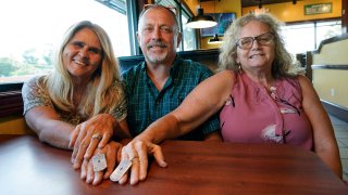 Debby-Neal Strickland, left, Jim Strickland, center, and Mylaen Merthe, right.