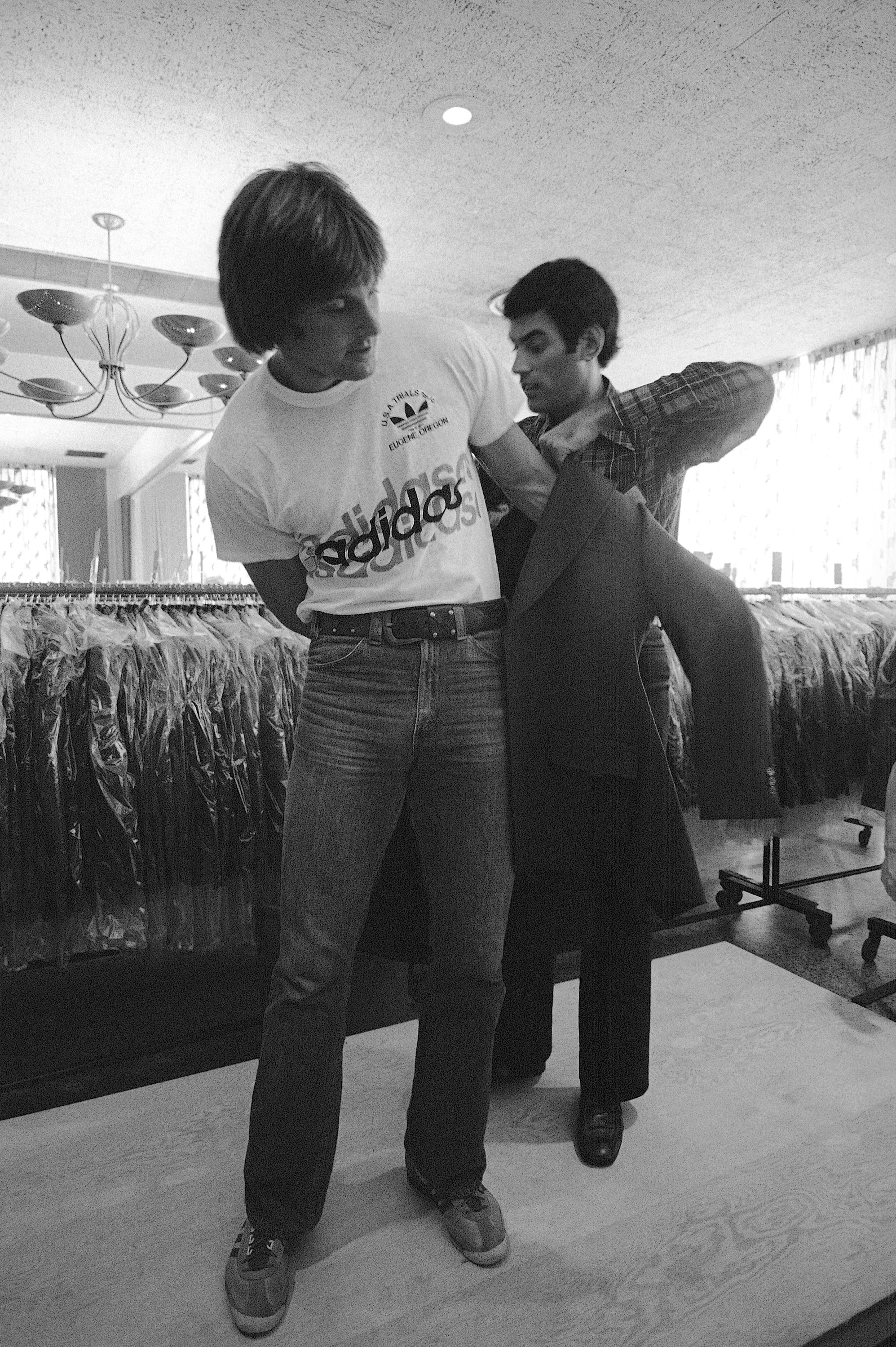 U.S. Olympic team decathlon competitor Bruce Jenner of San Jose, Calif., is fitted for his Olympic uniform in Plattsburgh, New York, on July 7, 1976.