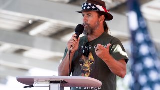 Alan Hostetter speaks during a pro-Trump election integrity rally he organized at the Orange County Registrar of Voters offices in Santa Ana, CA on Monday, November 9, 2020.