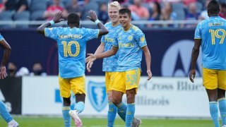 Philadelphia Union midfielder Quinn Sullivan (33) celebrates with teammates after scoring a goal in game action during a game between the Chicago Fire and the Philadelphia Union