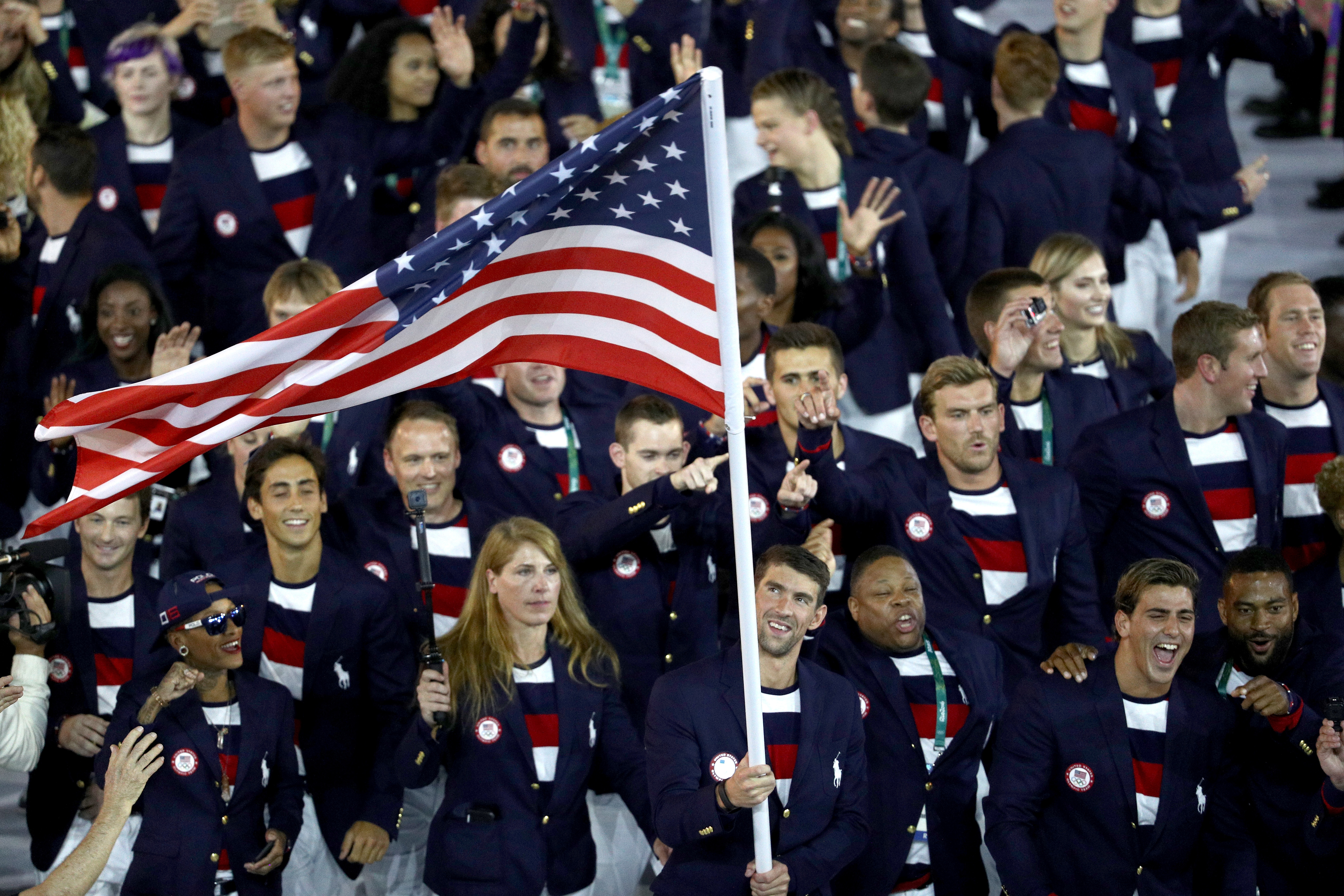 Flag bearer Michael Phelps of the United States leads the U.S. Olympic Team during the Opening Ceremony of the Rio 2016 Olympic Games on Aug. 5, 2016, in Rio de Janeiro, Brazil.