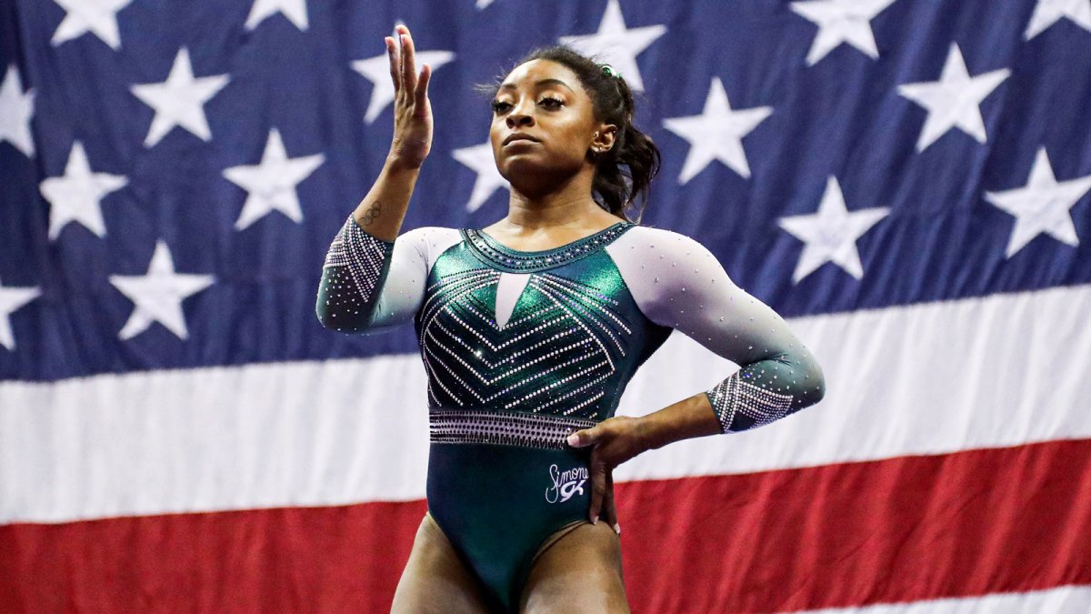 Simone Biles at Packers vs Bengals game, rocking Jonathan Owens jersey