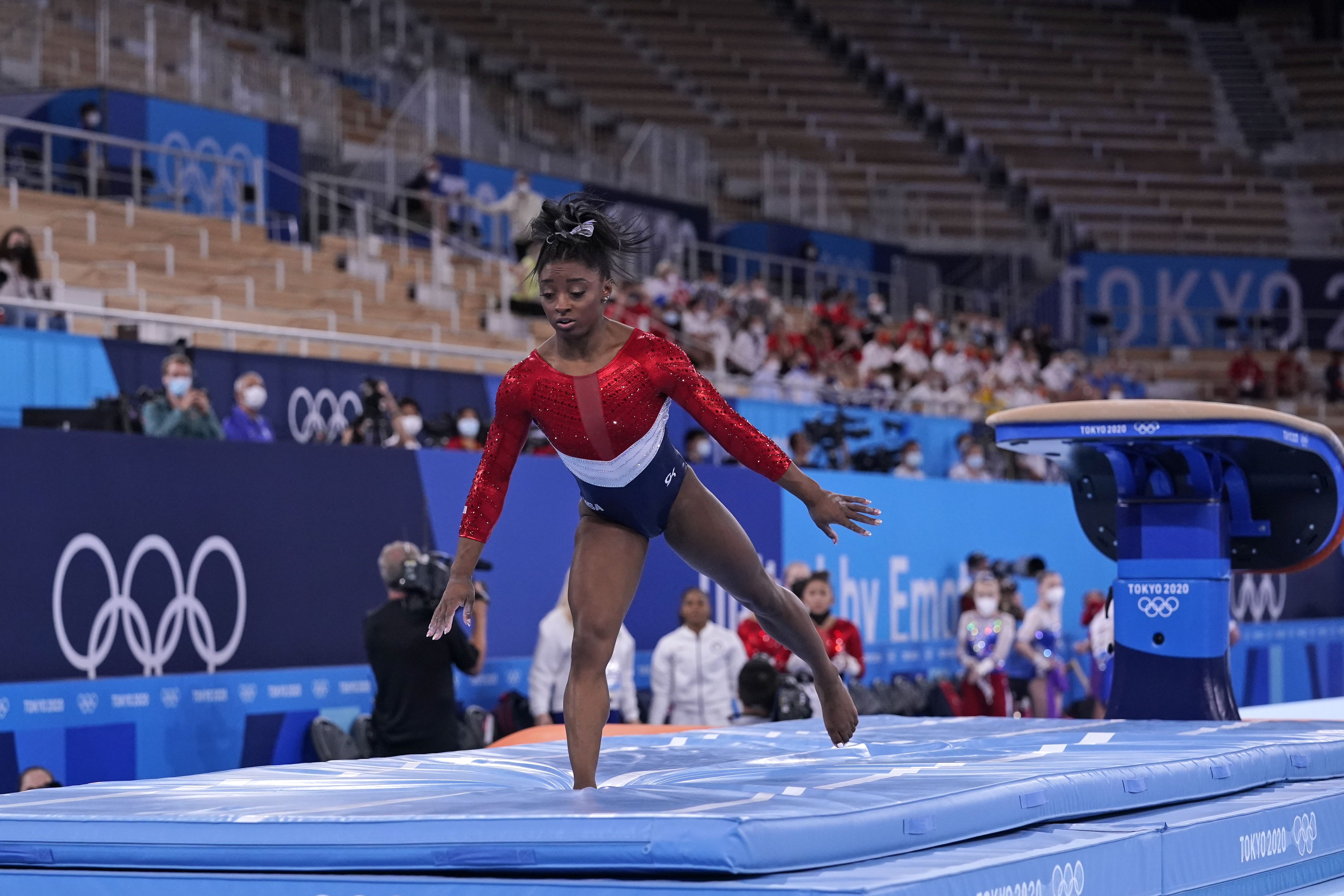 Simone Biles, of the United States, dismounts from the vault during the artistic gymnastics women's final at the 2020 Summer Olympics, Tuesday, July 27, 2021, in Tokyo.