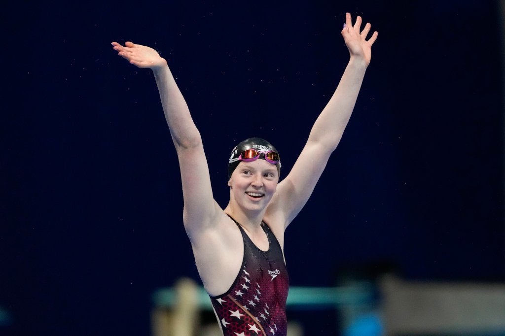 Lydia Jacoby, of the United States, celebrates after winning the final of the women's 100-meter breaststroke at the 2020 Summer Olympics, Tuesday, July 27, 2021, in Tokyo, Japan.