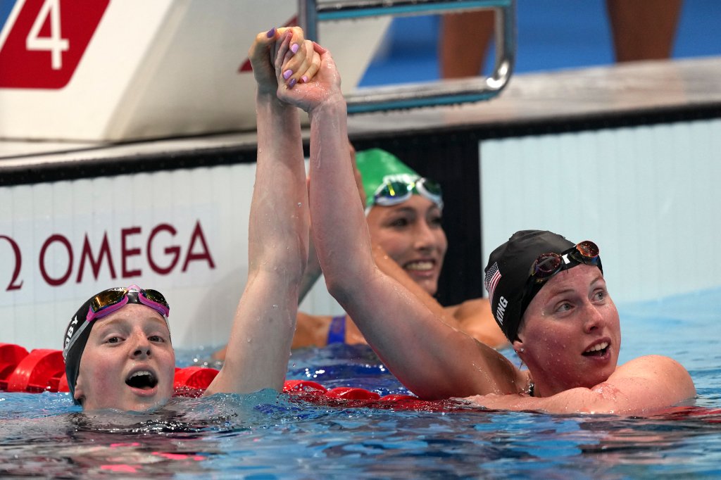 Gold medalist Lydia Jacoby, left, of the United States, is congratulated by bronze medalist and compatriot Lilly King after winning the final of the women's 100-meter breaststroke at the 2020 Summer Olympics, Tuesday, July 27, 2021, in Tokyo, Japan.