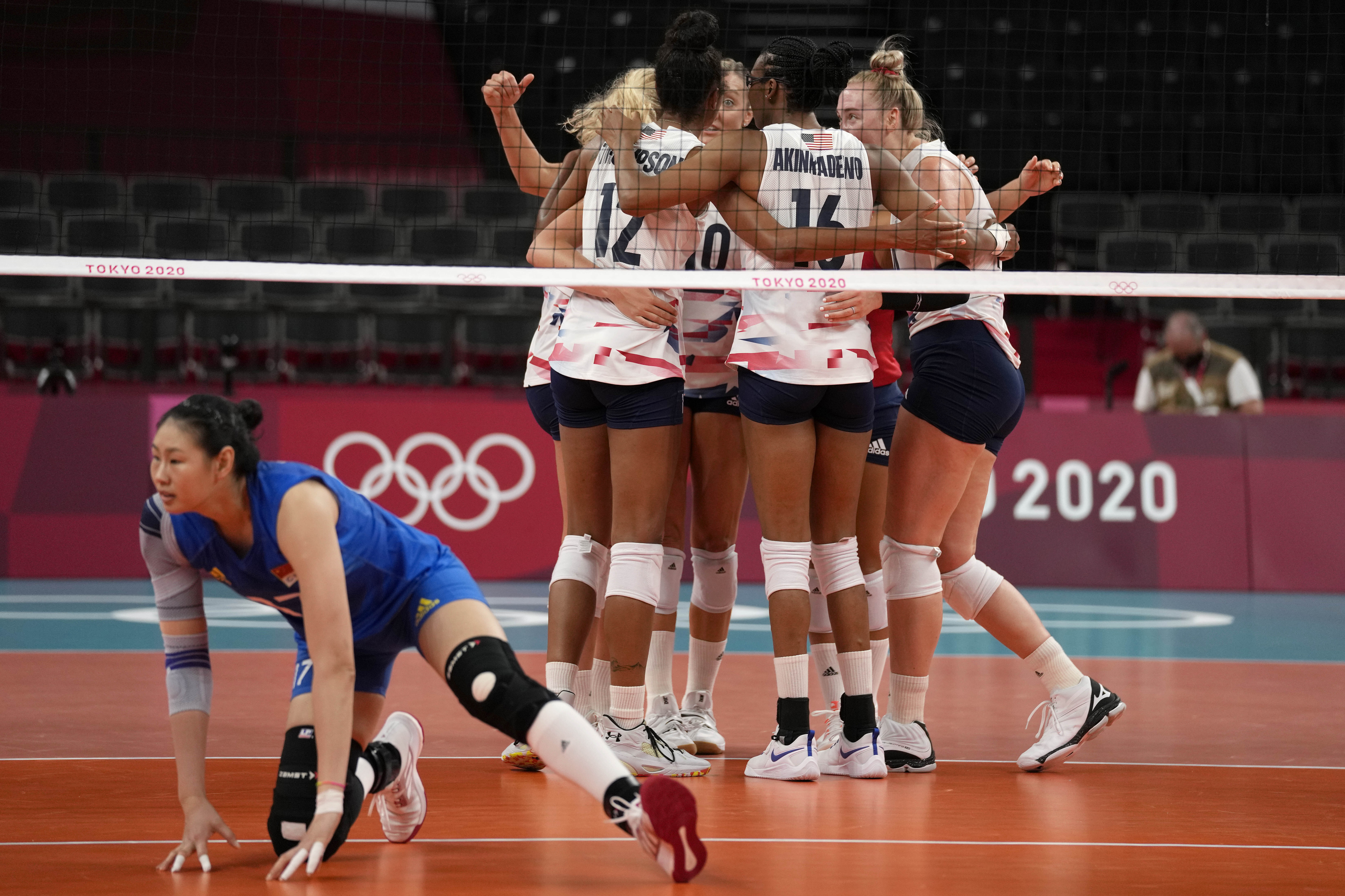 United States teammates celebrate during the women's volleyball preliminary round pool B match between China and United States at the 2020 Olympics on July 27, 2021, in Tokyo, Japan.