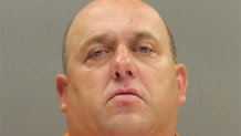 A mugshot of Edward Cagney Mathews.