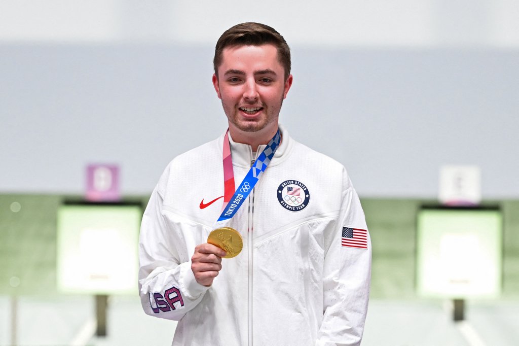 Gold medallist USA's William Shaner poses on the podium during the medal ceremony for the men's 10m air rifle final during the Tokyo 2020 Olympic Games at the Asaka Shooting Range in the Nerima district of Tokyo on July 25, 2021. 