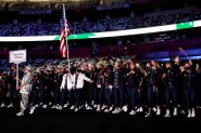 Flag bearers Sue Bird and Eddy Alvarez of Team United States lead their team out during the Opening Ceremony of the Tokyo 2020 Olympic Games at Olympic Stadium on July 23, 2021 in Tokyo, Japan.