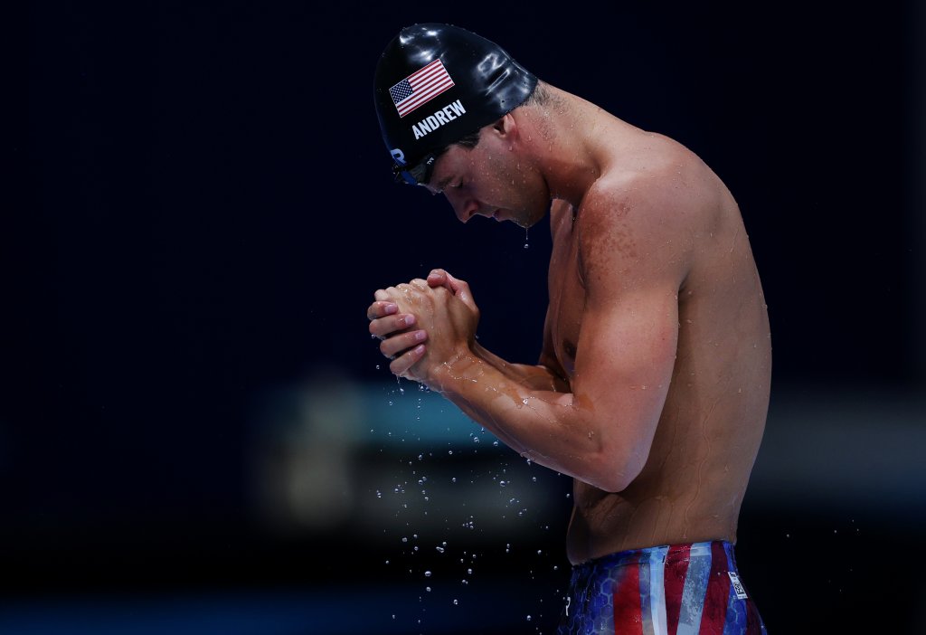 Michael Andrew of Team United States reacts after competing in the Men's 100m Breaststroke Final on day three of the Tokyo 2020 Olympic Games at Tokyo Aquatics Centre on July 26, 2021, in Tokyo, Japan.